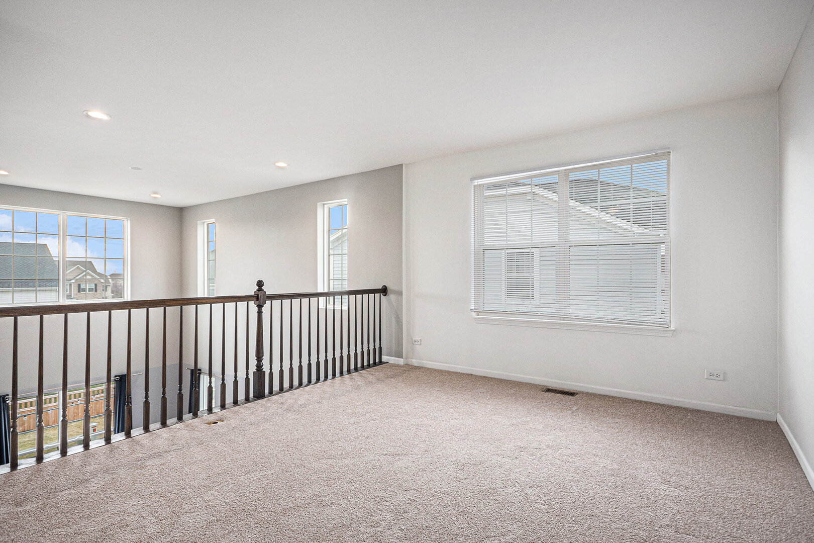 12811 Conifer Street Plainfield, IL 60585 - Photo 16 of 47 a view of an empty room with a window