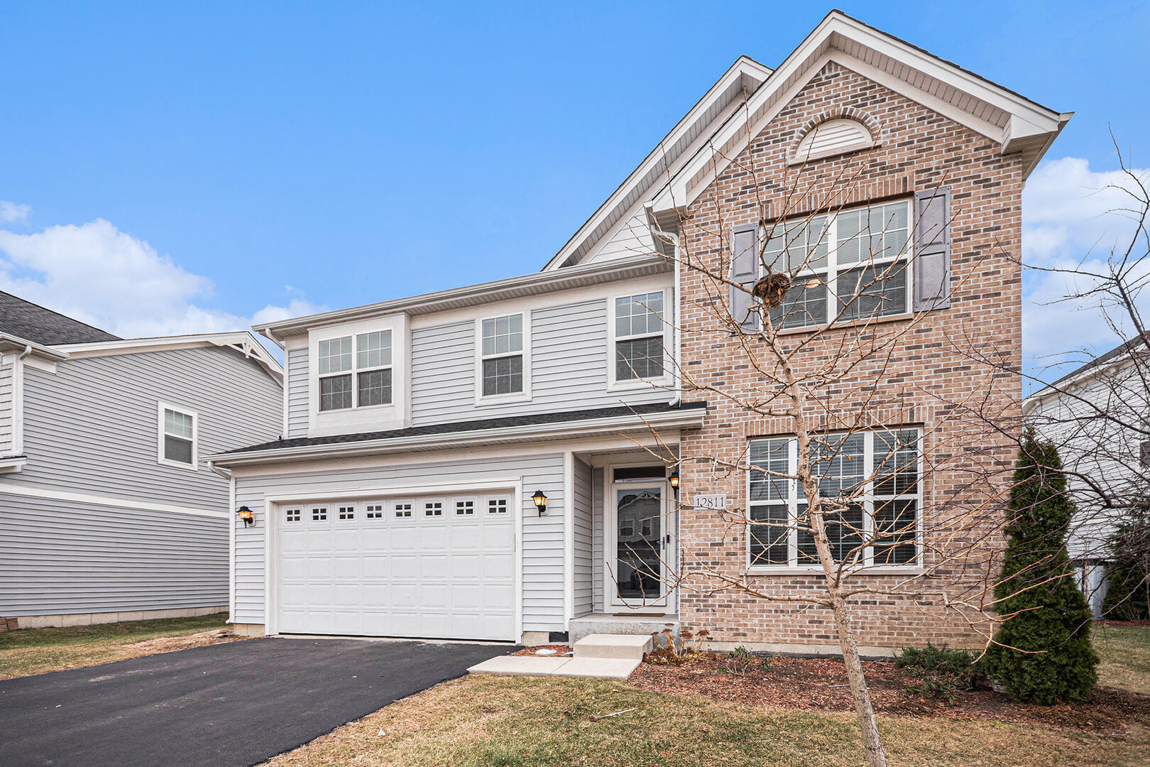 12811 Conifer Street Plainfield, IL 60585 - Photo 29 of 47 a front view of a house with a yard