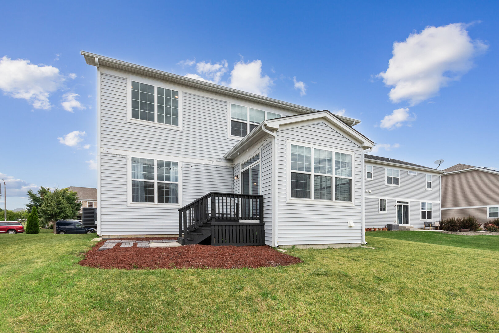 12811 Conifer Street Plainfield, IL 60585 - Photo 33 of 47 a front view of a house with a yard