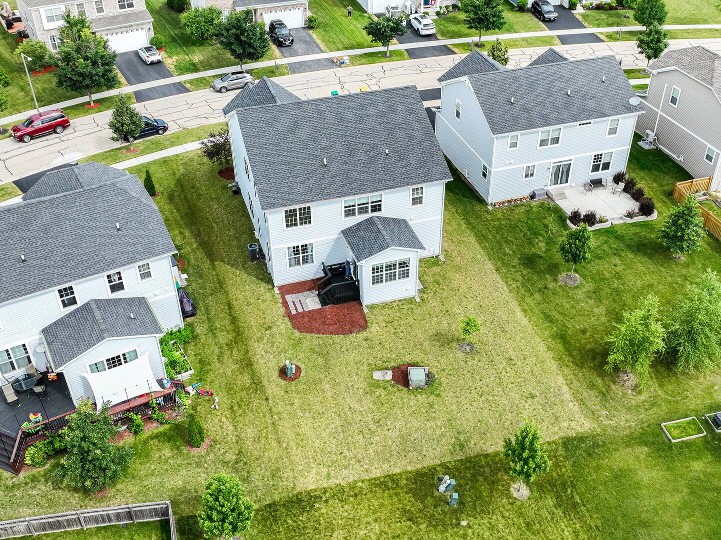 12811 Conifer Street Plainfield, IL 60585 - Photo 35 of 47 an aerial view of residential house with outdoor space and parking