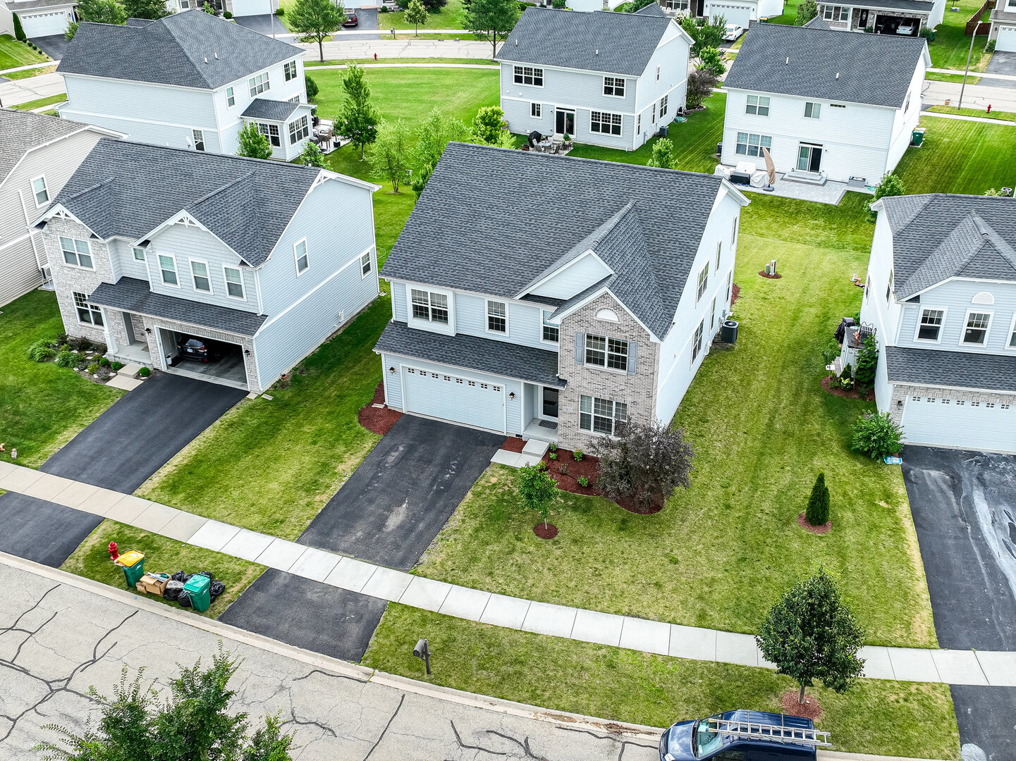 12811 Conifer Street Plainfield, IL 60585 - Photo 36 of 47 an aerial view of residential houses with yard