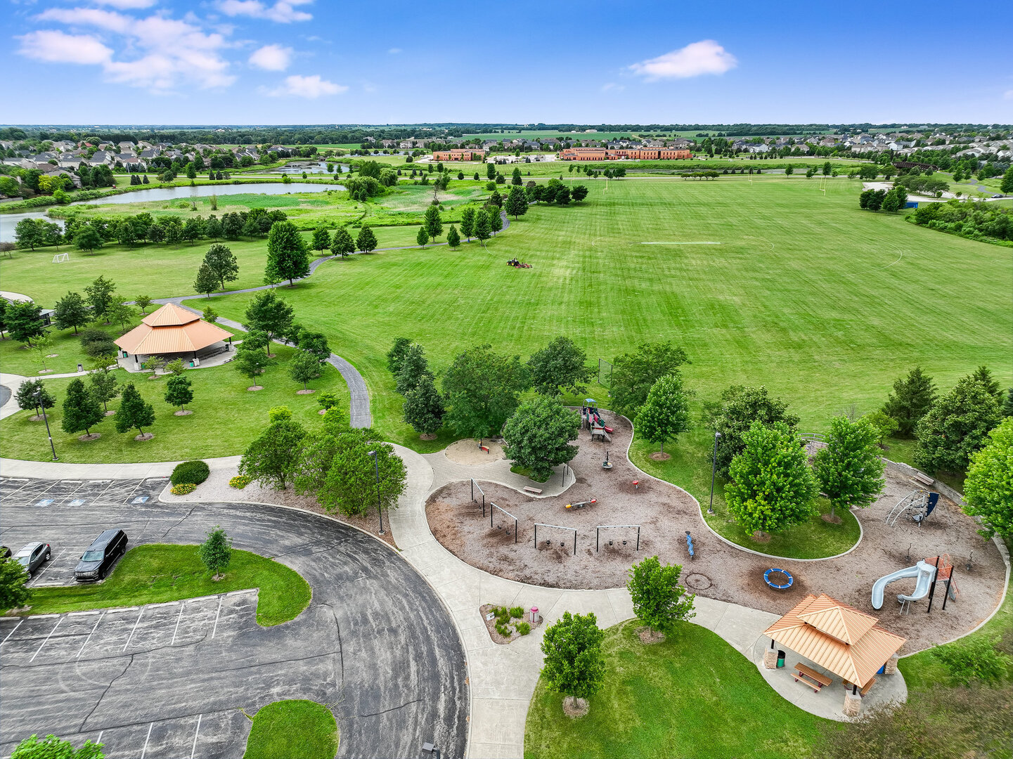 12811 Conifer Street Plainfield, IL 60585 - Photo 43 of 47 an aerial view of a house with a garden and yard