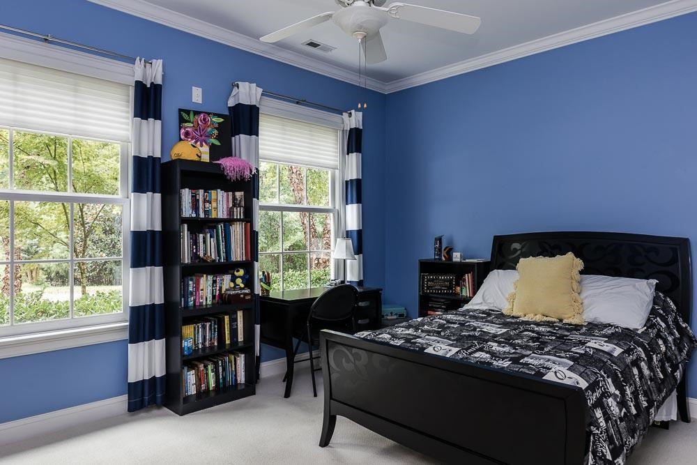 5204 Atherton Bridge Road Raleigh, NC 27613 - Photo 29 of 30 Another, even larger, secondary bedroom with two double closets and gobs of natural light! Bedroom 4