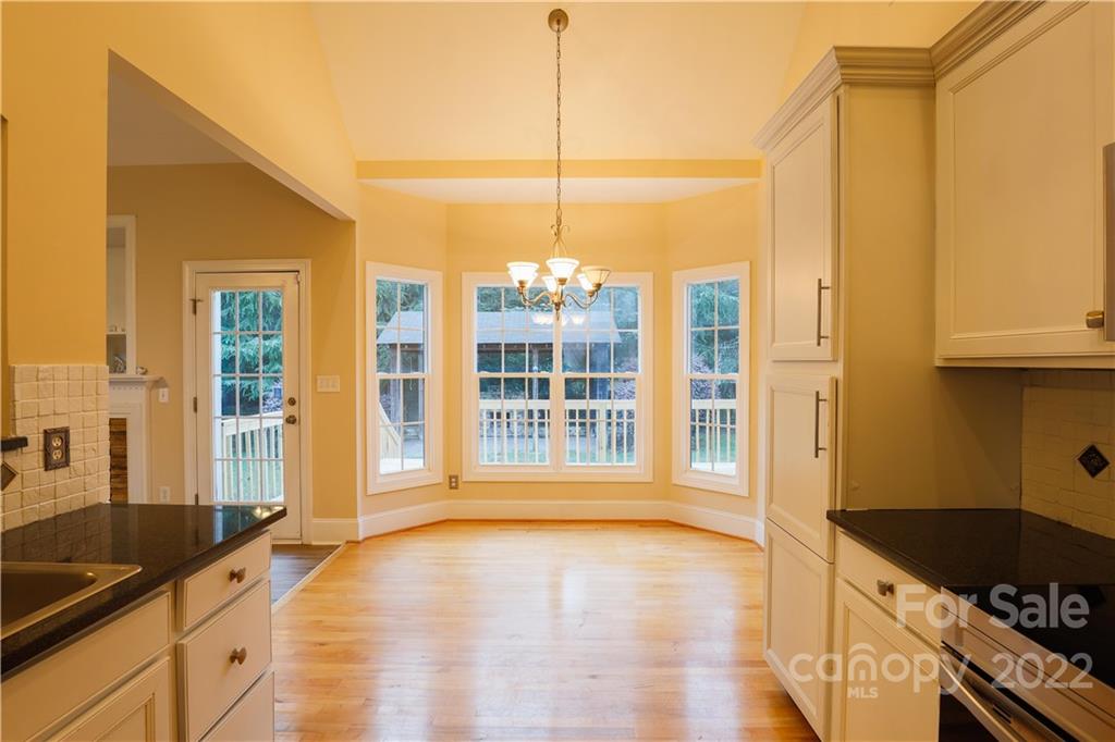 142 Princess Loop Troutman, NC 28166 - Photo 12 of 22 a view of a kitchen with a sink and cabinets
