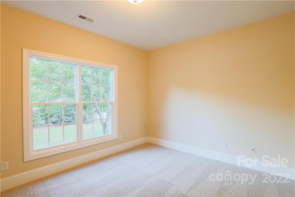 142 Princess Loop Troutman, NC 28166 - Photo 18 of 22 a view of empty room with window
