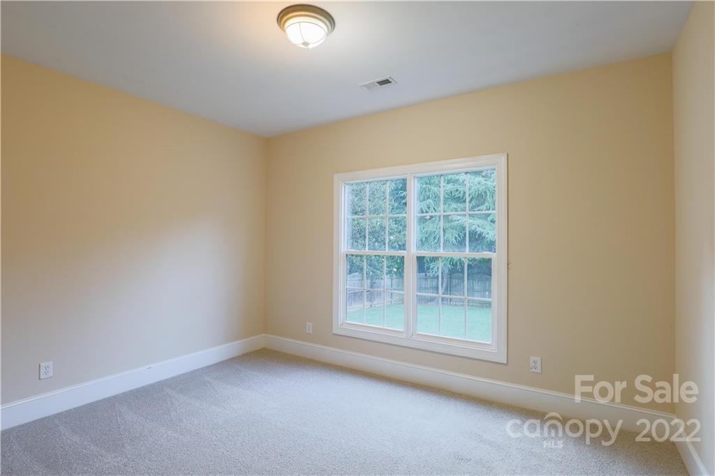 142 Princess Loop Troutman, NC 28166 - Photo 19 of 22 an empty room with a window