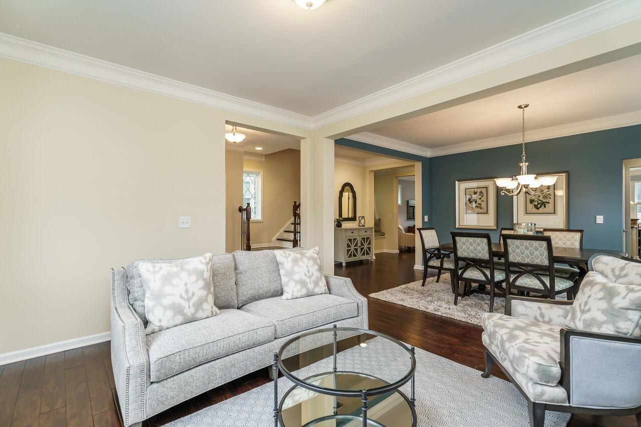 5602 Wade Park Boulevard Raleigh, NC 27607 - Photo 8 of 34 Living room opens to formal dining room---perfect for parties! Main Floor
