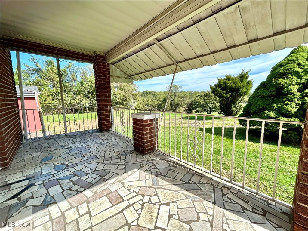 164 Locust Lane Follansbee, WV 26037 - Photo 2 of 19 Patio / terrace featuring a lawn