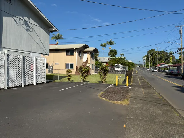 a view of a street with cars