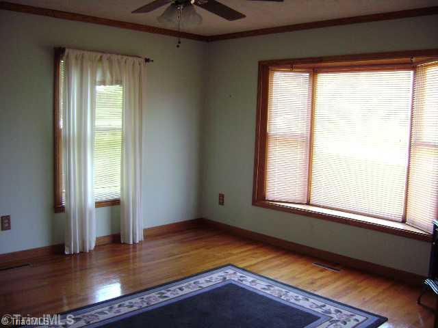 1348 Hartman Road Lexington, NC 27295 - Photo 2 of 16 Exterior Front. Den with hardwood flooring and bay window.