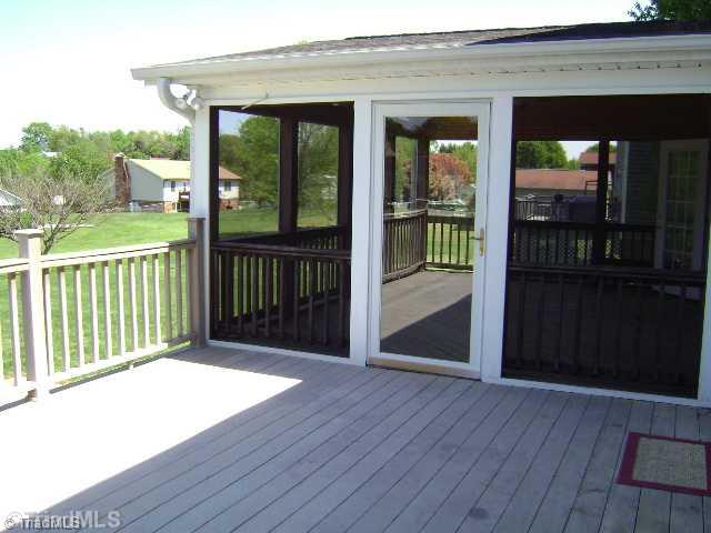 1348 Hartman Road Lexington, NC 27295 - Photo 15 of 16 Exterior Front. Another view of deck and screened porch.