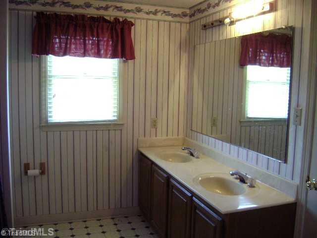 1348 Hartman Road Lexington, NC 27295 - Photo 8 of 16 Exterior Front. Master bathroom with double sink vanity.