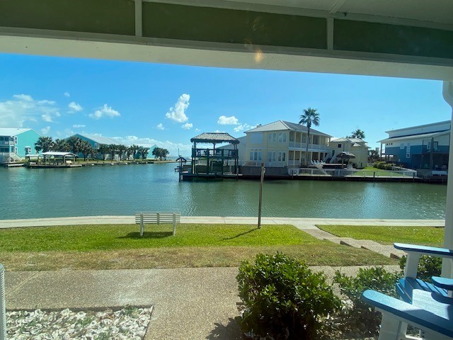 2290 North Fulton Beach Road, Unit A113 Rockport, TX 78382 - Photo 7 of 13 a view of a lake with a city