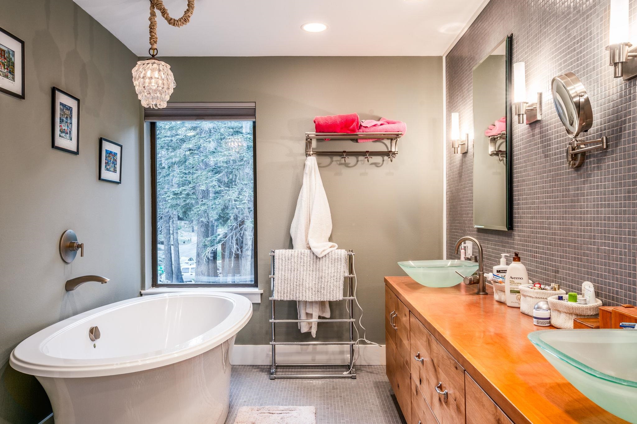 2 Holiday Way Mammoth Lakes, CA 93546 - Photo 12 of 37 a bathroom with a sink and a mirror