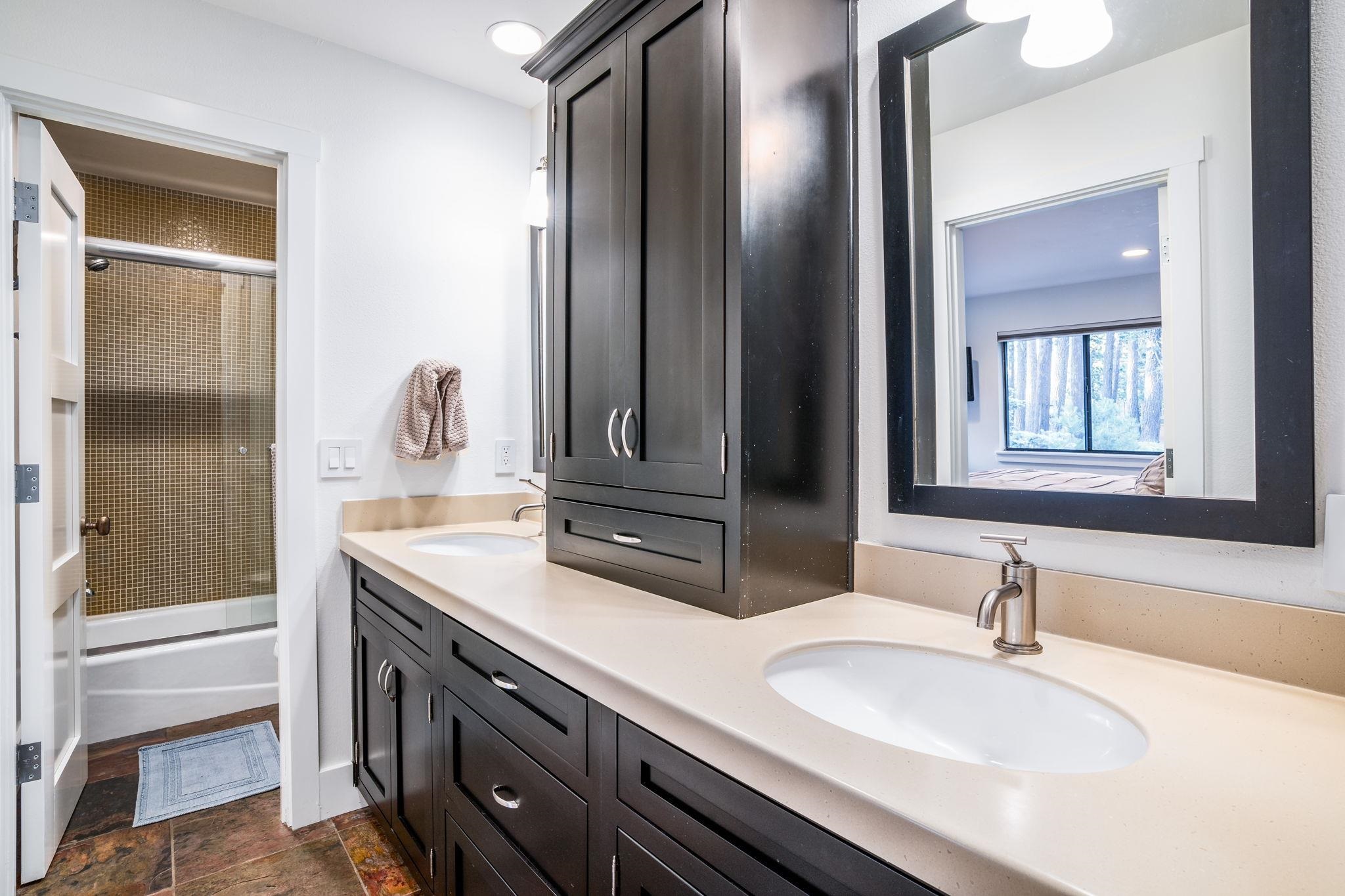 2 Holiday Way Mammoth Lakes, CA 93546 - Photo 15 of 37 a bathroom with a sink and a mirror