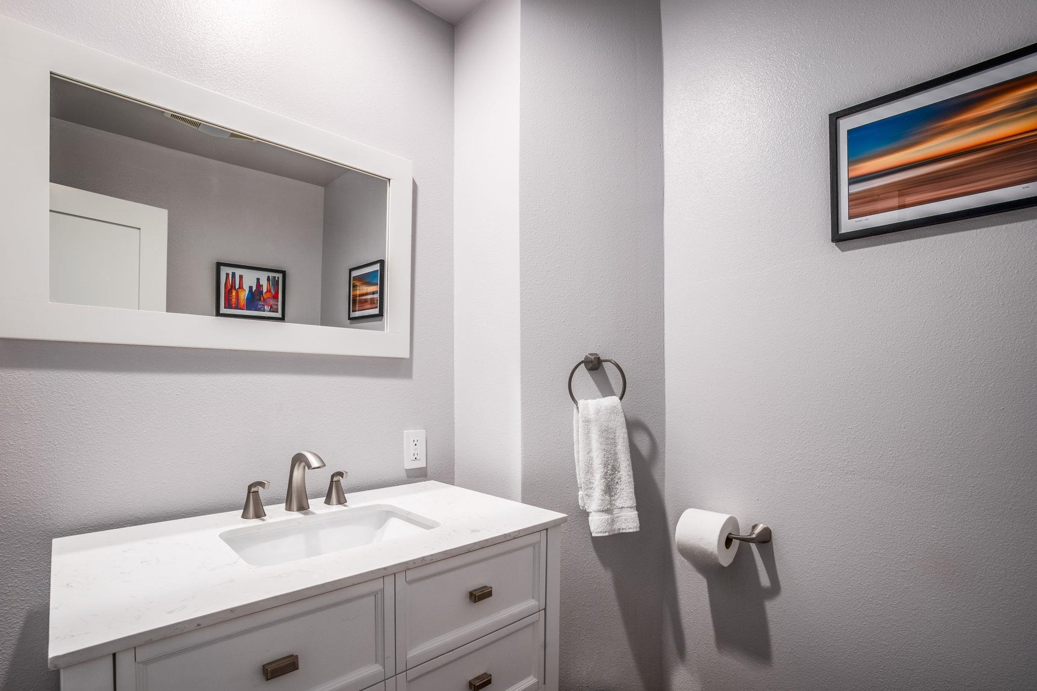 2 Holiday Way Mammoth Lakes, CA 93546 - Photo 18 of 37 a bathroom with a sink vanity and a mirror