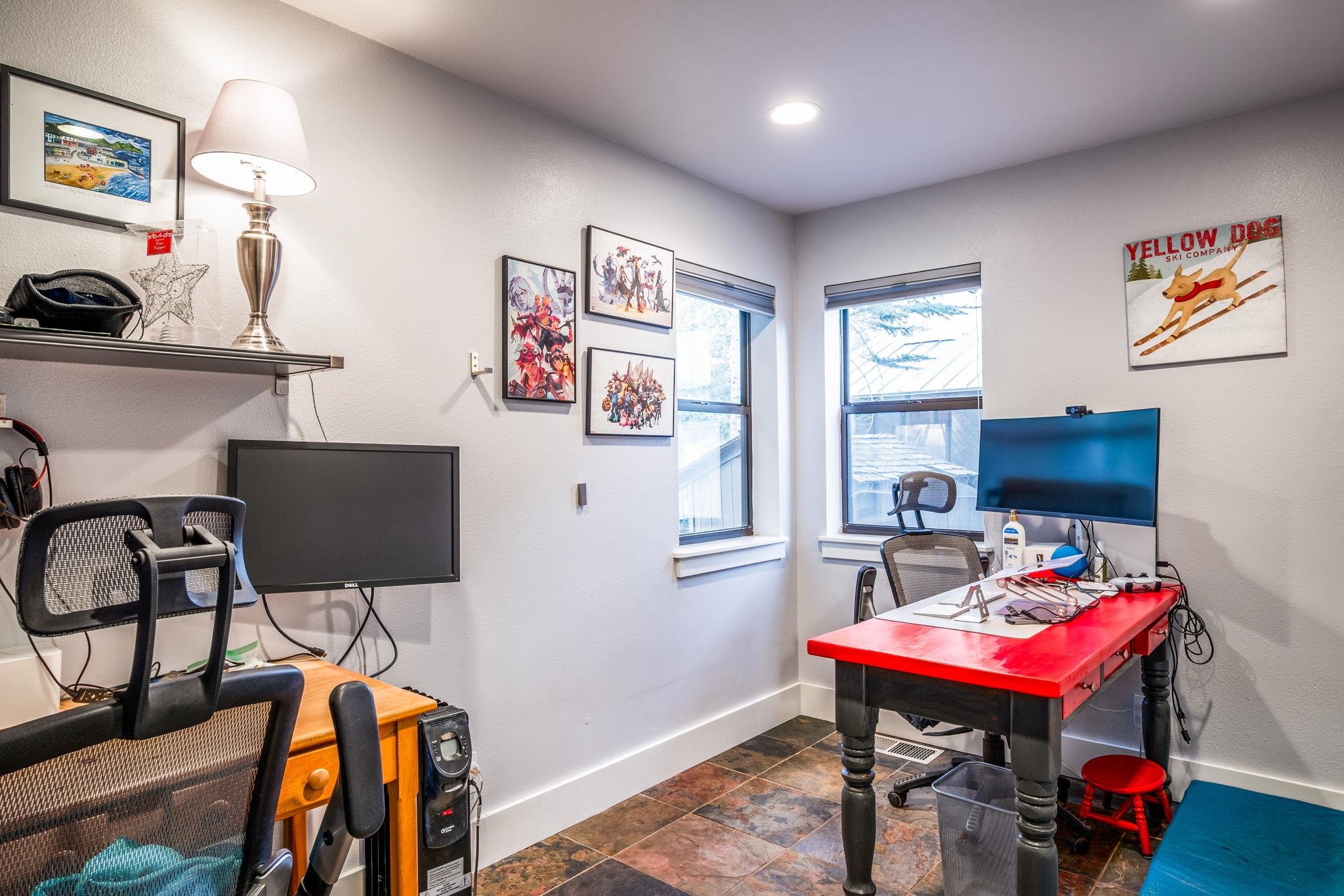 2 Holiday Way Mammoth Lakes, CA 93546 - Photo 20 of 37 a living room with furniture and a flat screen tv