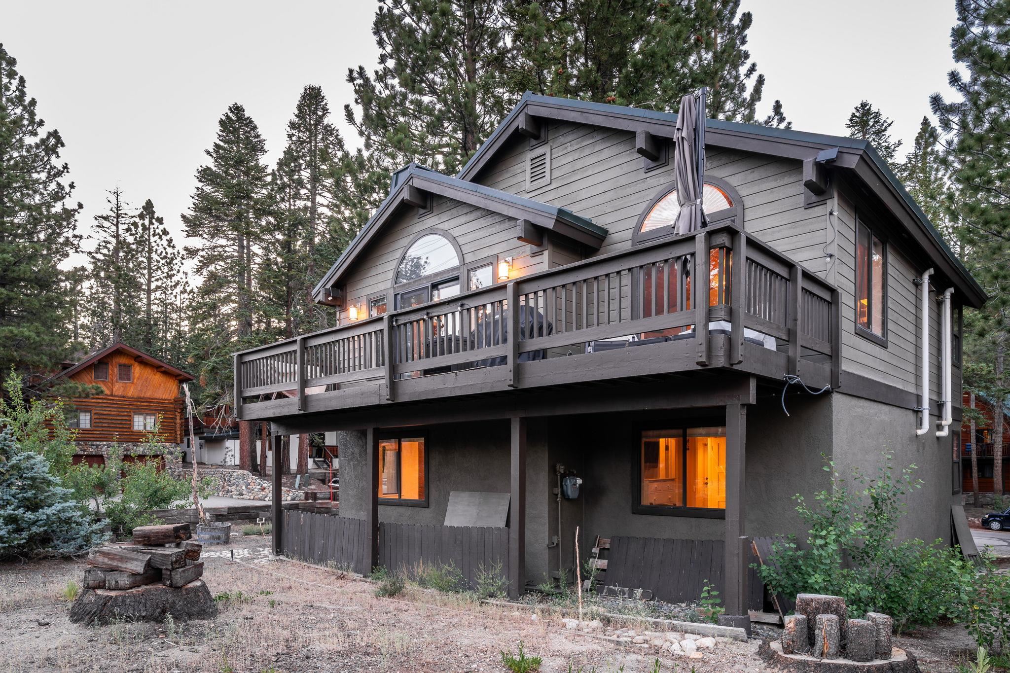2 Holiday Way Mammoth Lakes, CA 93546 - Photo 26 of 37 a view of a house with a patio and backyard
