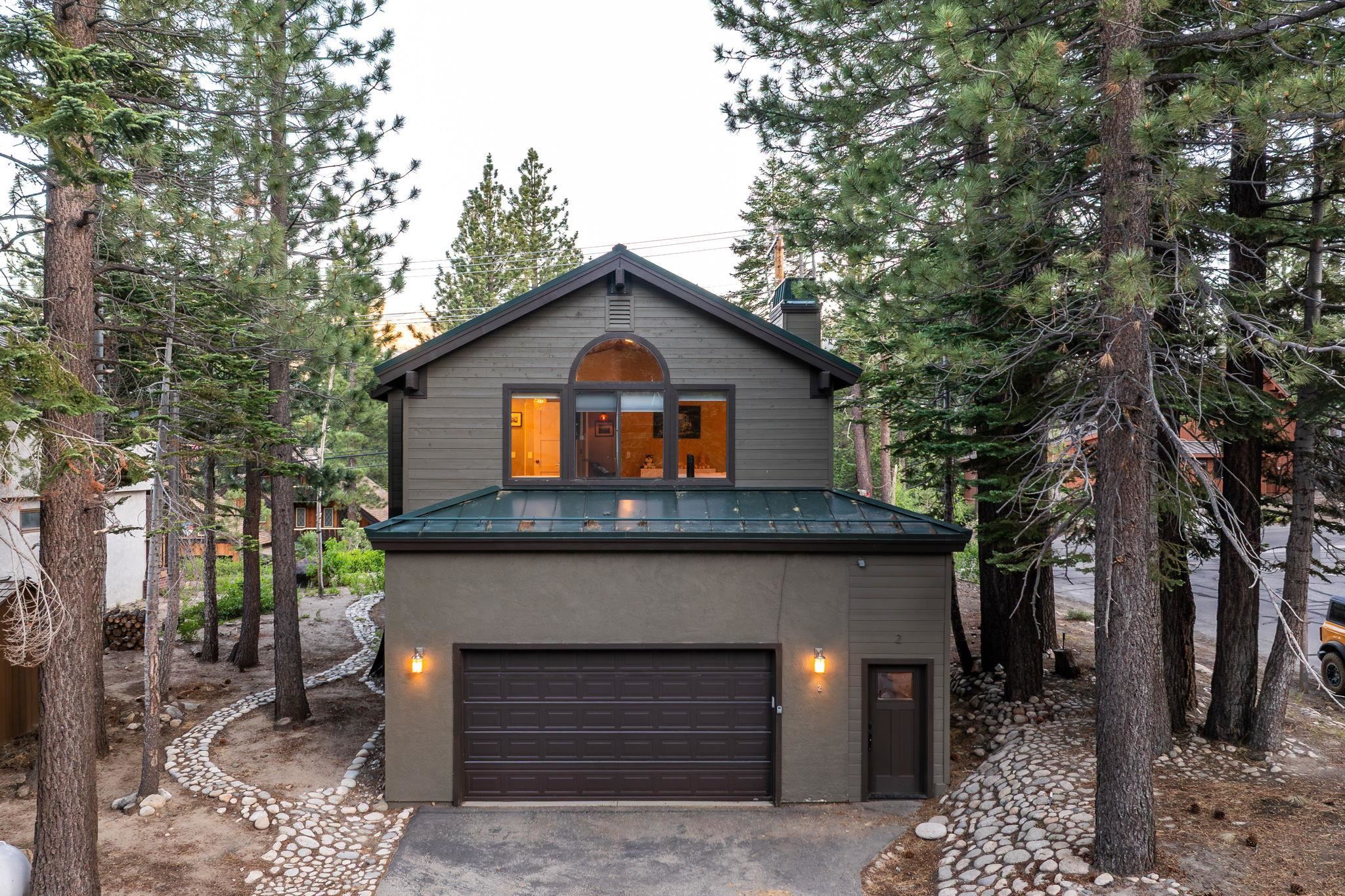 2 Holiday Way Mammoth Lakes, CA 93546 - Photo 30 of 37 a front view of a house with a tree