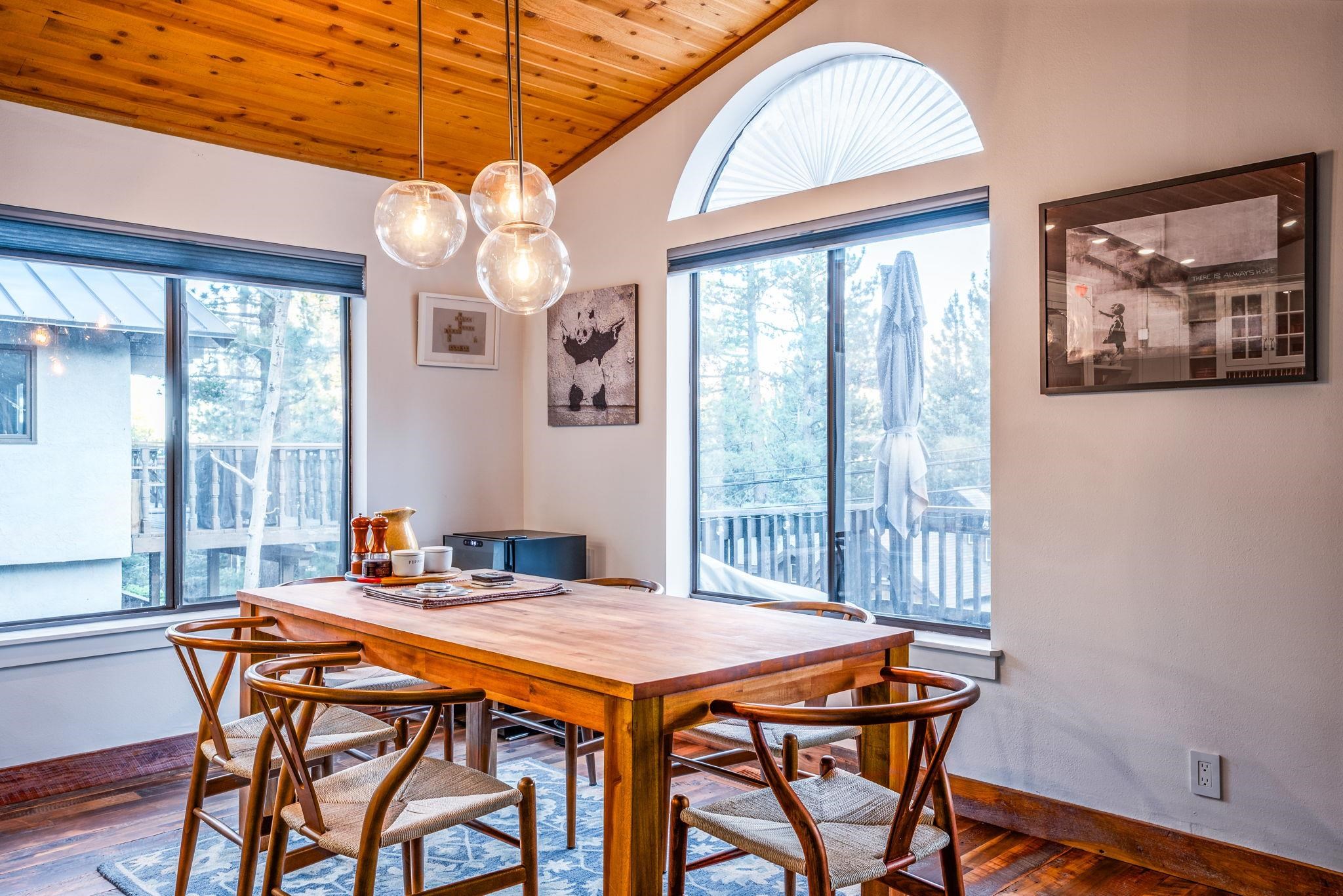 2 Holiday Way Mammoth Lakes, CA 93546 - Photo 4 of 37 a dining room with a large window table and chairs
