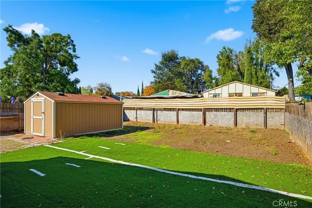 a view of a backyard with a garden