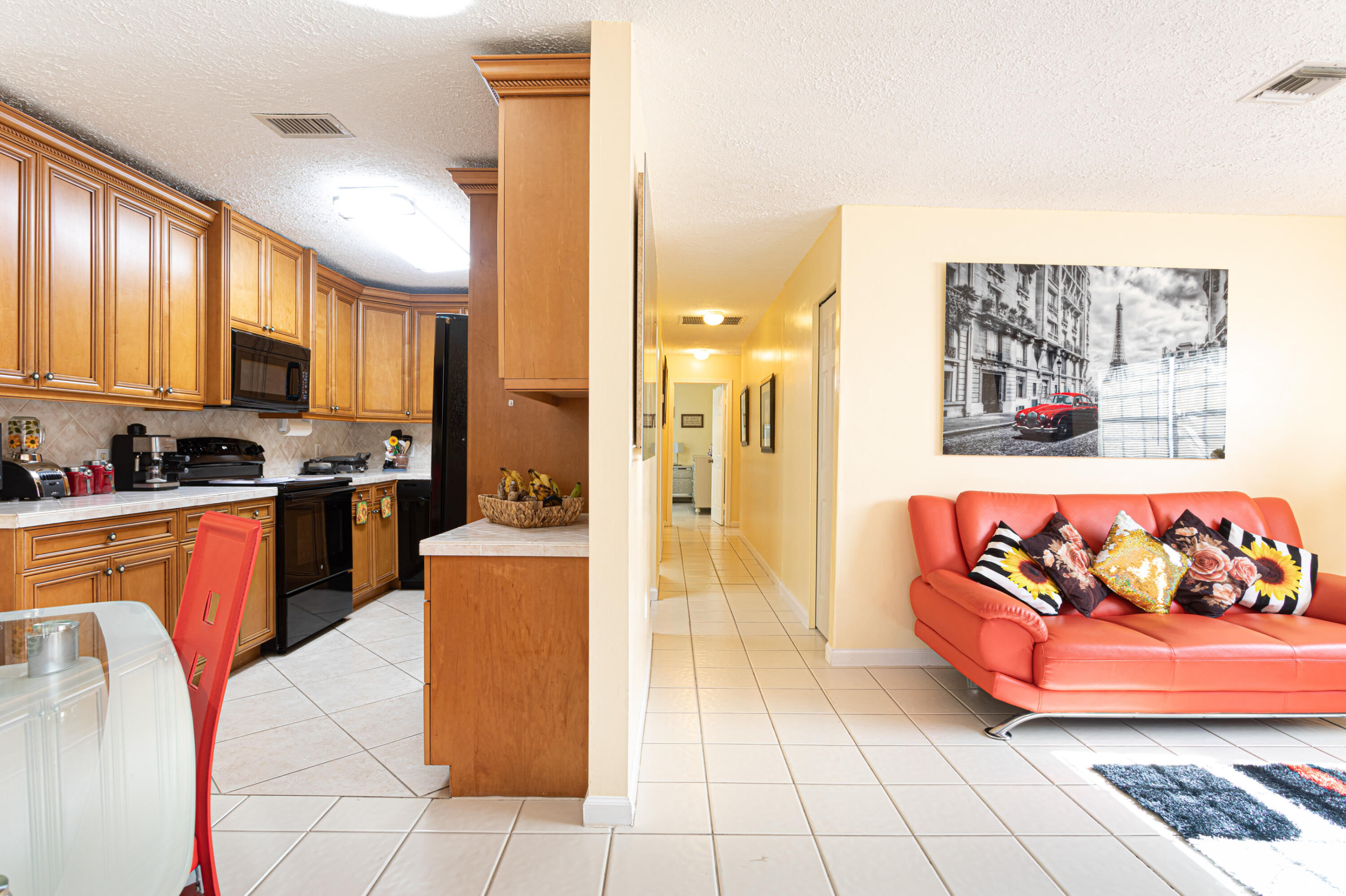 5961 Mango Road Royal Palm Estates, FL 33413 - Photo 8 of 30 Kitchen/Hallway/Living Room