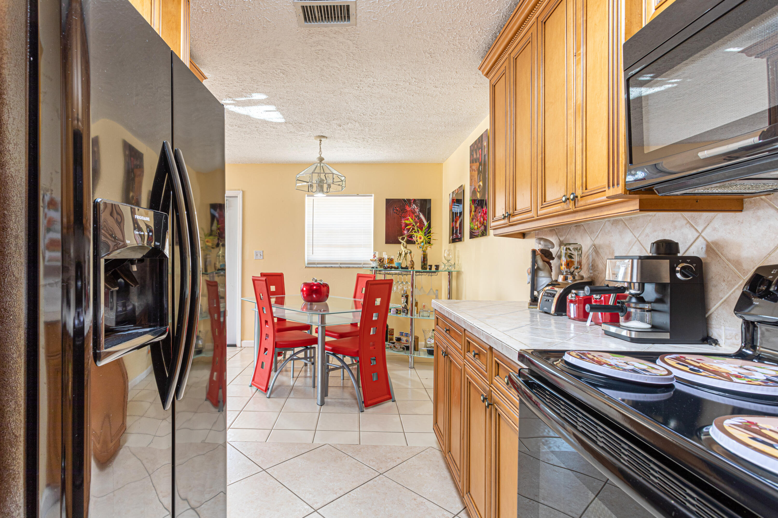 5961 Mango Road Royal Palm Estates, FL 33413 - Photo 9 of 30 Kitchen/Dining Room