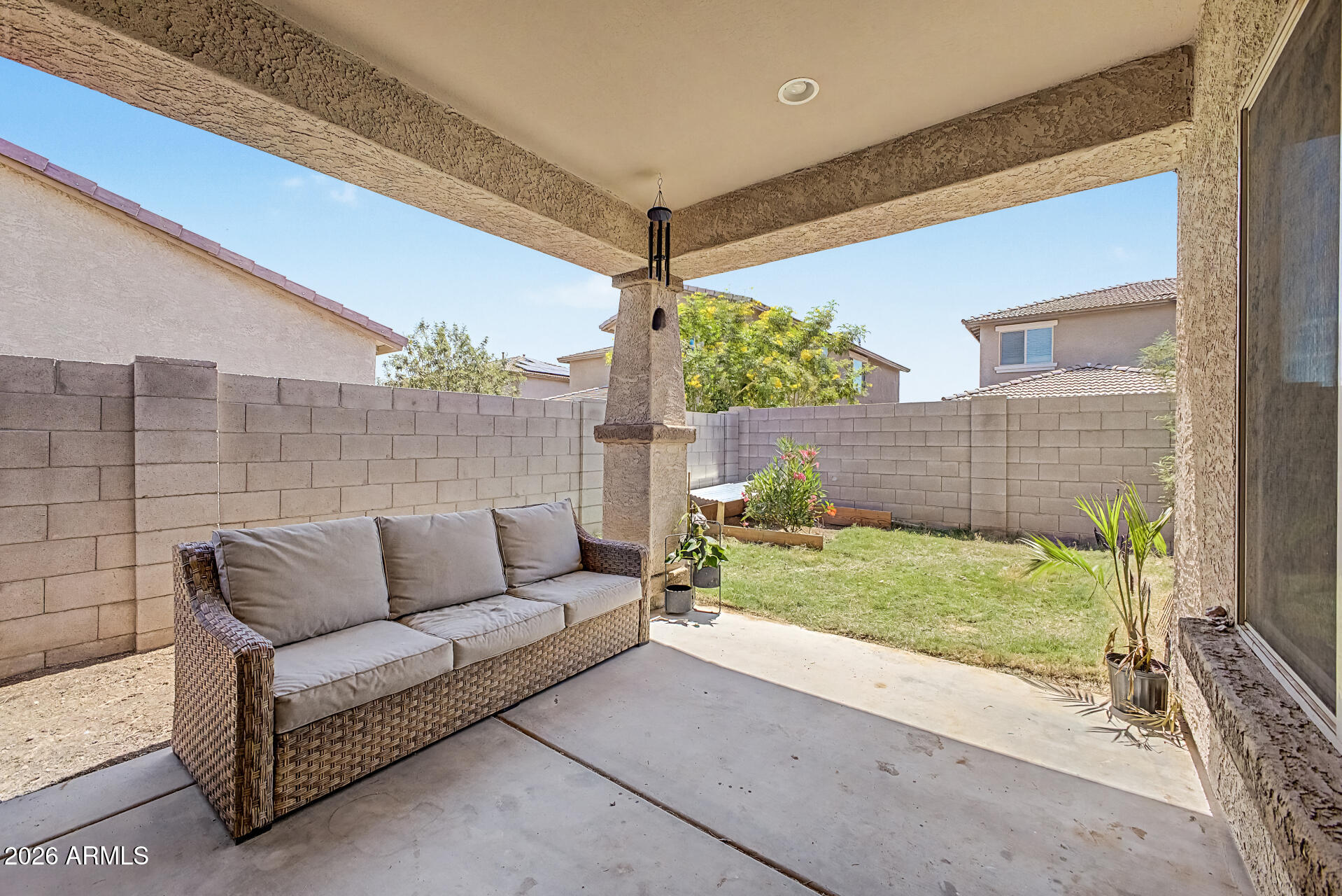 16719 West Rowel Road Surprise, AZ 85387 - Photo 24 of 28 a view of backyard with seating space