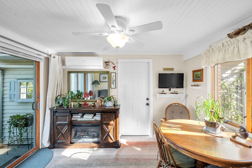 34 Adams Street Ludlow, MA 01056 - Photo 17 of 42 a workspace with furniture window and wooden floor