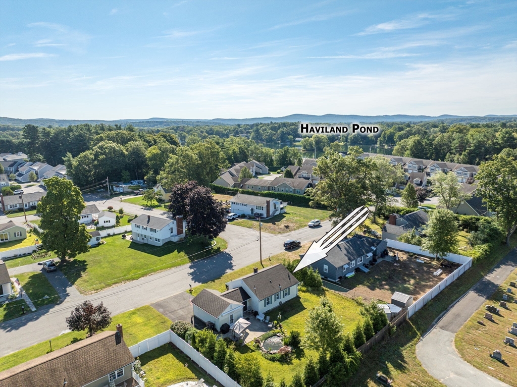 34 Adams Street Ludlow, MA 01056 - Photo 2 of 42 an aerial view of a house with a garden