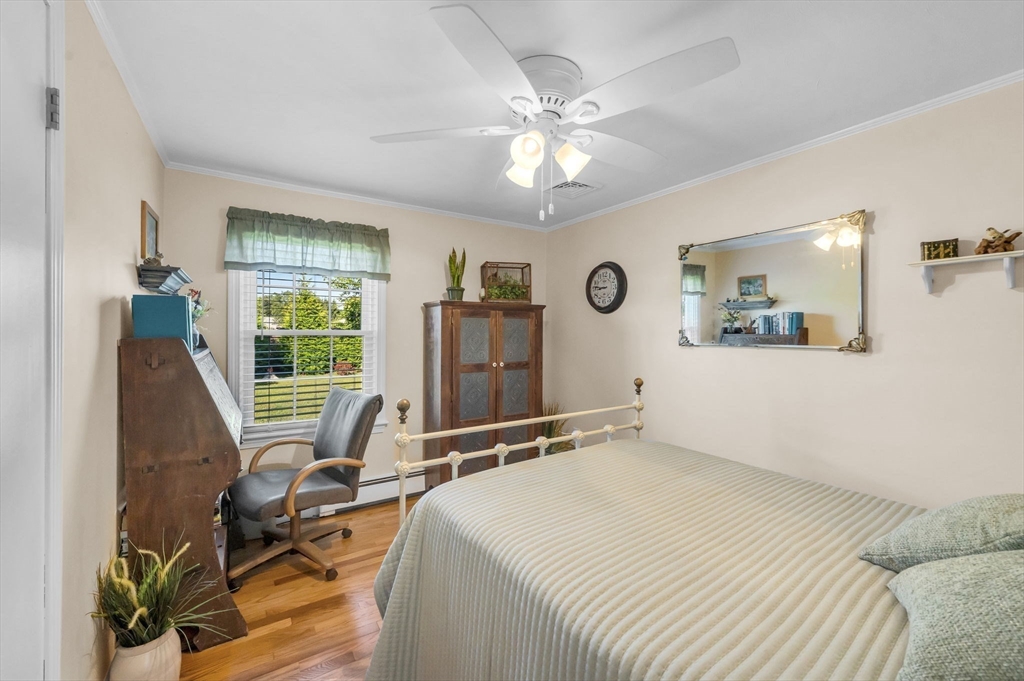 34 Adams Street Ludlow, MA 01056 - Photo 29 of 42 a room with a bed and a desk