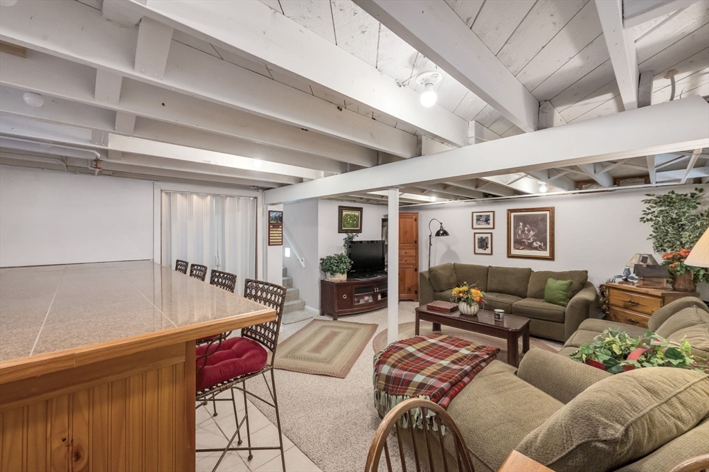 34 Adams Street Ludlow, MA 01056 - Photo 33 of 42 a living room with furniture and wooden floor