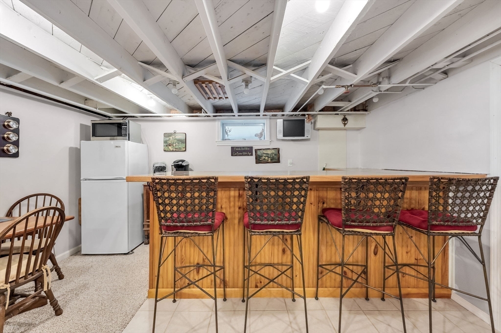 34 Adams Street Ludlow, MA 01056 - Photo 34 of 42 a view of a chairs and table in a room