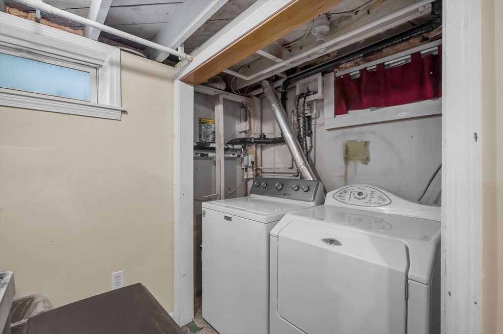 34 Adams Street Ludlow, MA 01056 - Photo 35 of 42 a view of storage and utility room with washer and dryer