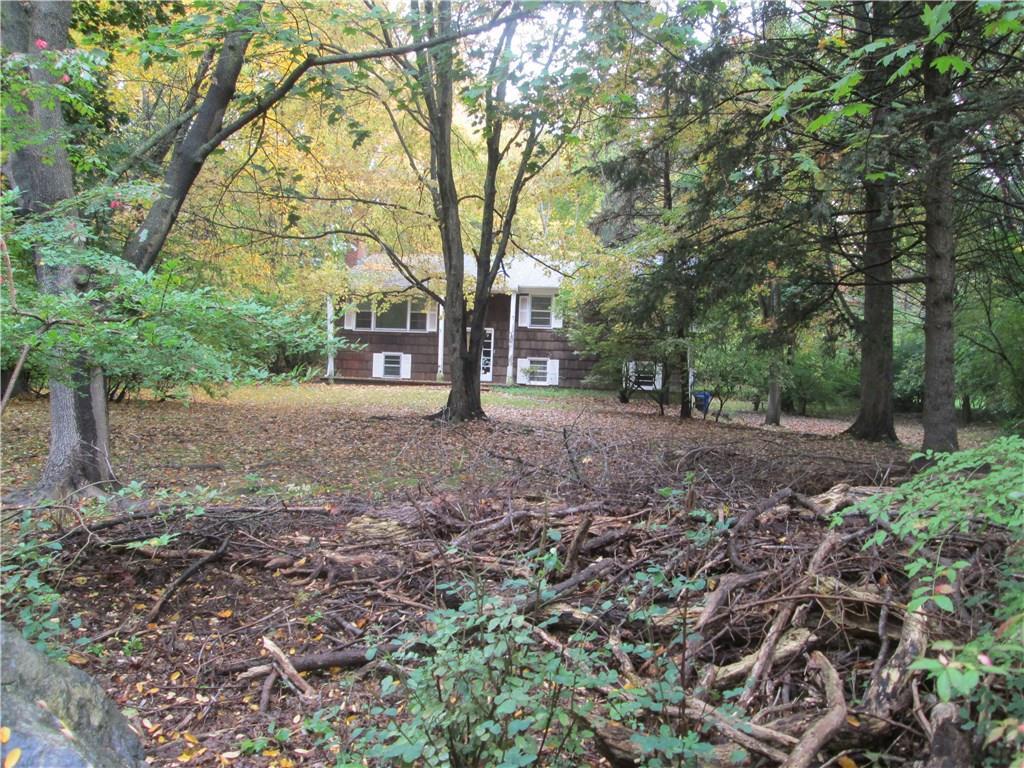 12 Betmarlea Road Norwalk, CT 06850 - Photo 1 of 1 a view of a yard with a tree