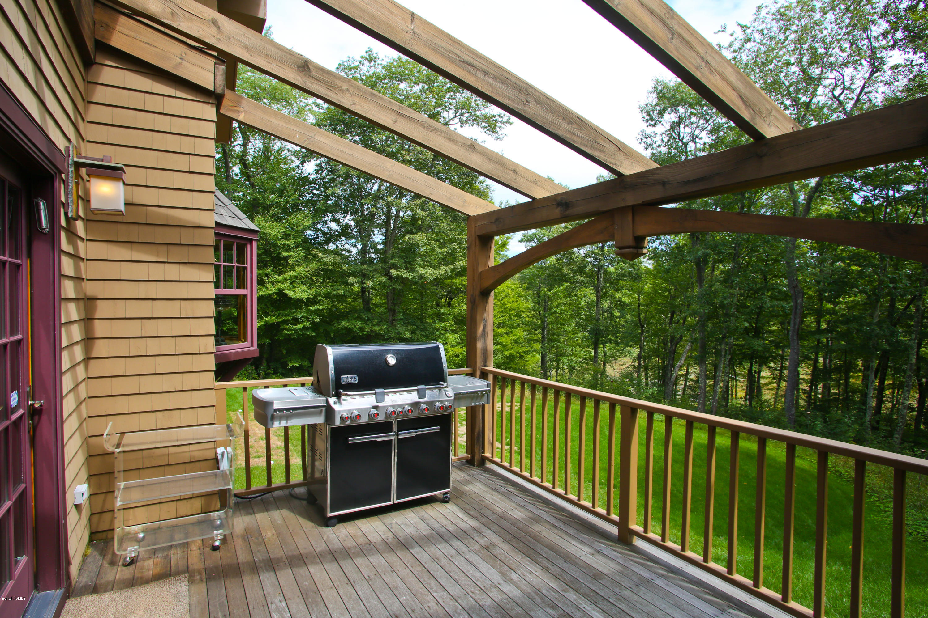 9 Mt Hunger Road Monterey, MA 01245 - Photo 14 of 44 a view of a balcony with chairs
