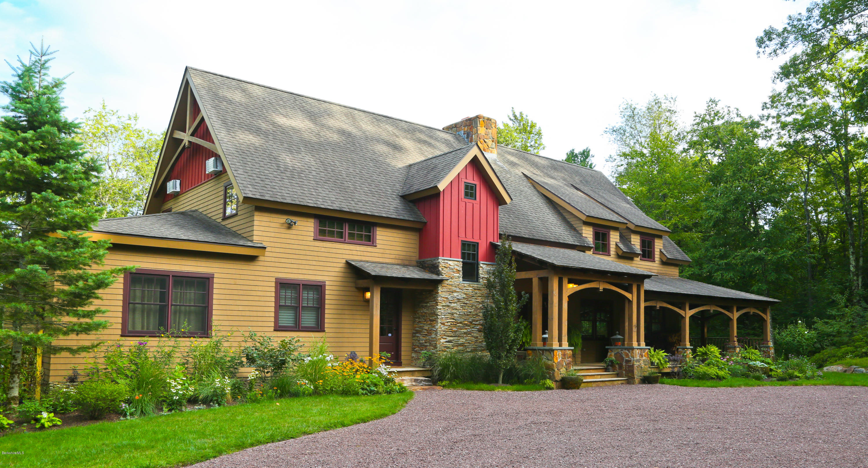 9 Mt Hunger Road Monterey, MA 01245 - Photo 3 of 44 a front view of a house with a yard