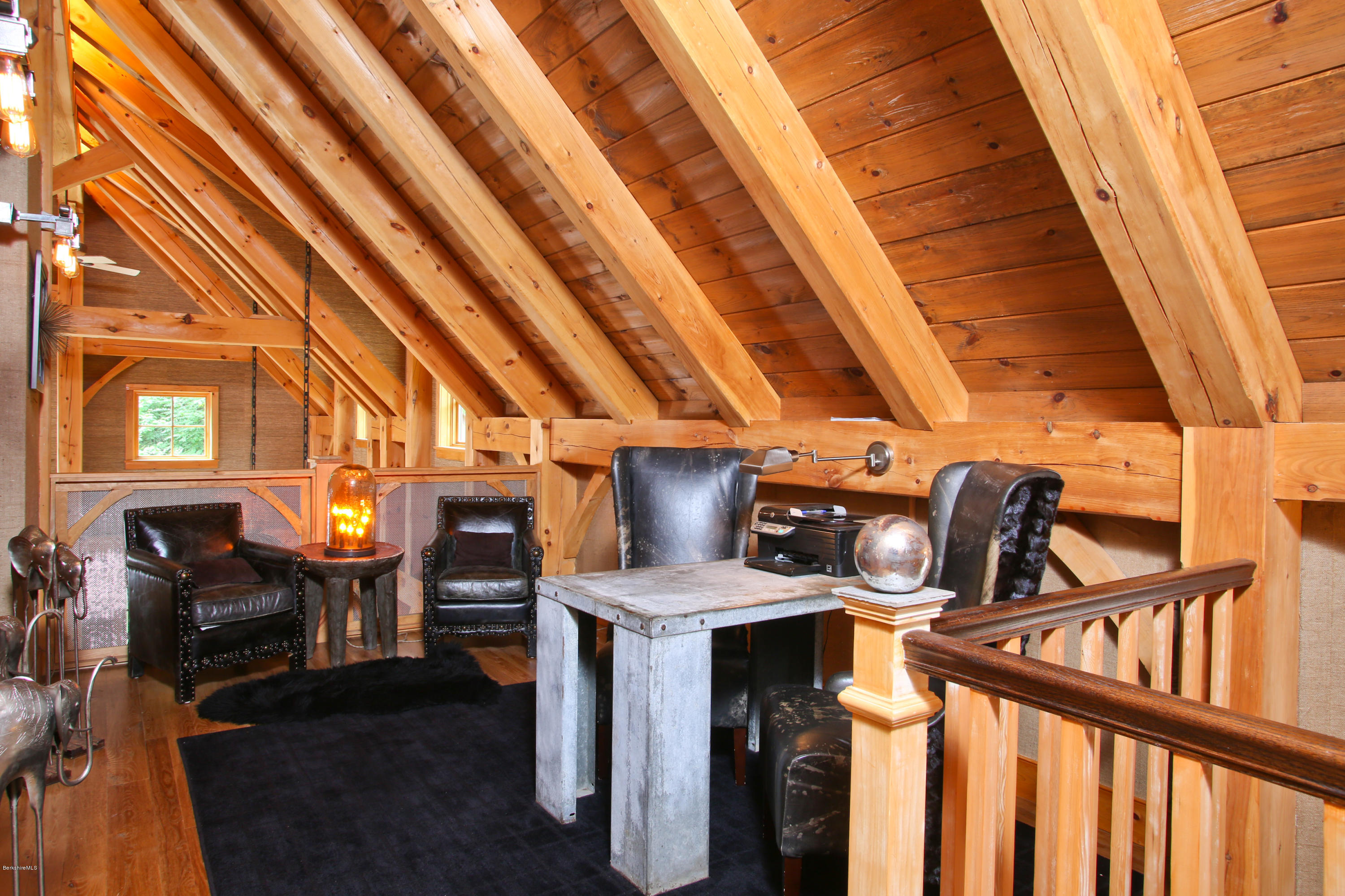9 Mt Hunger Road Monterey, MA 01245 - Photo 21 of 44 a view of an chairs and table in the balcony
