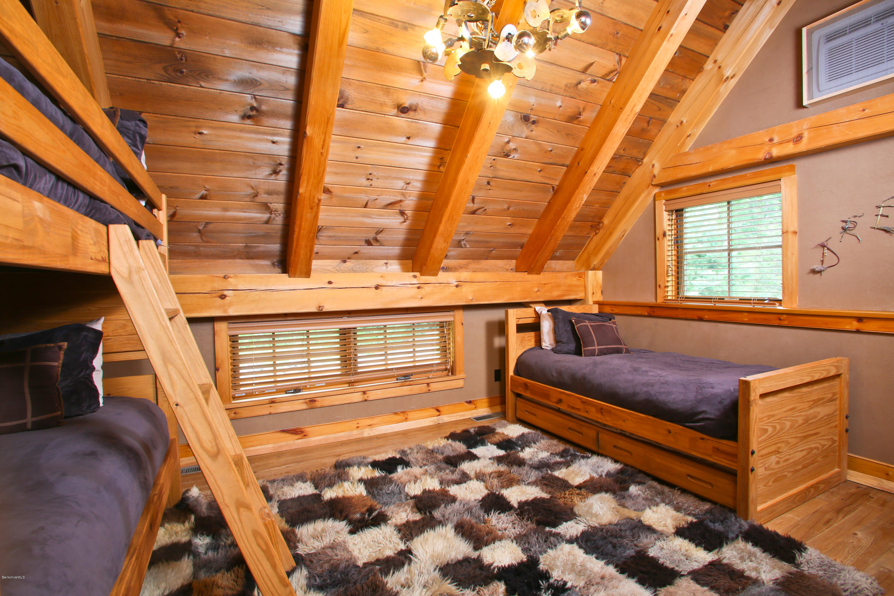 9 Mt Hunger Road Monterey, MA 01245 - Photo 25 of 44 a bedroom with furniture and a window