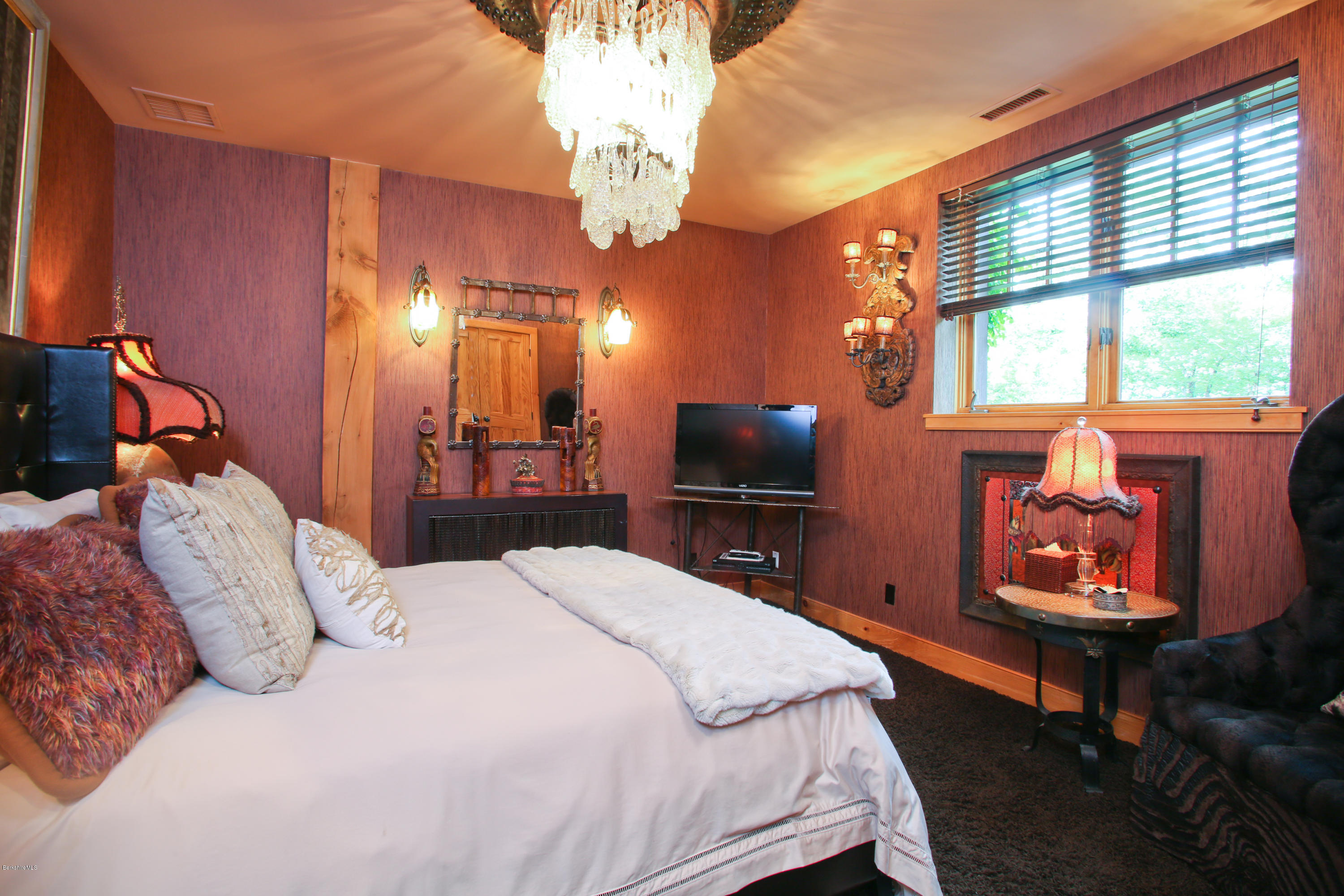9 Mt Hunger Road Monterey, MA 01245 - Photo 31 of 44 a bedroom with a bed and wooden floor