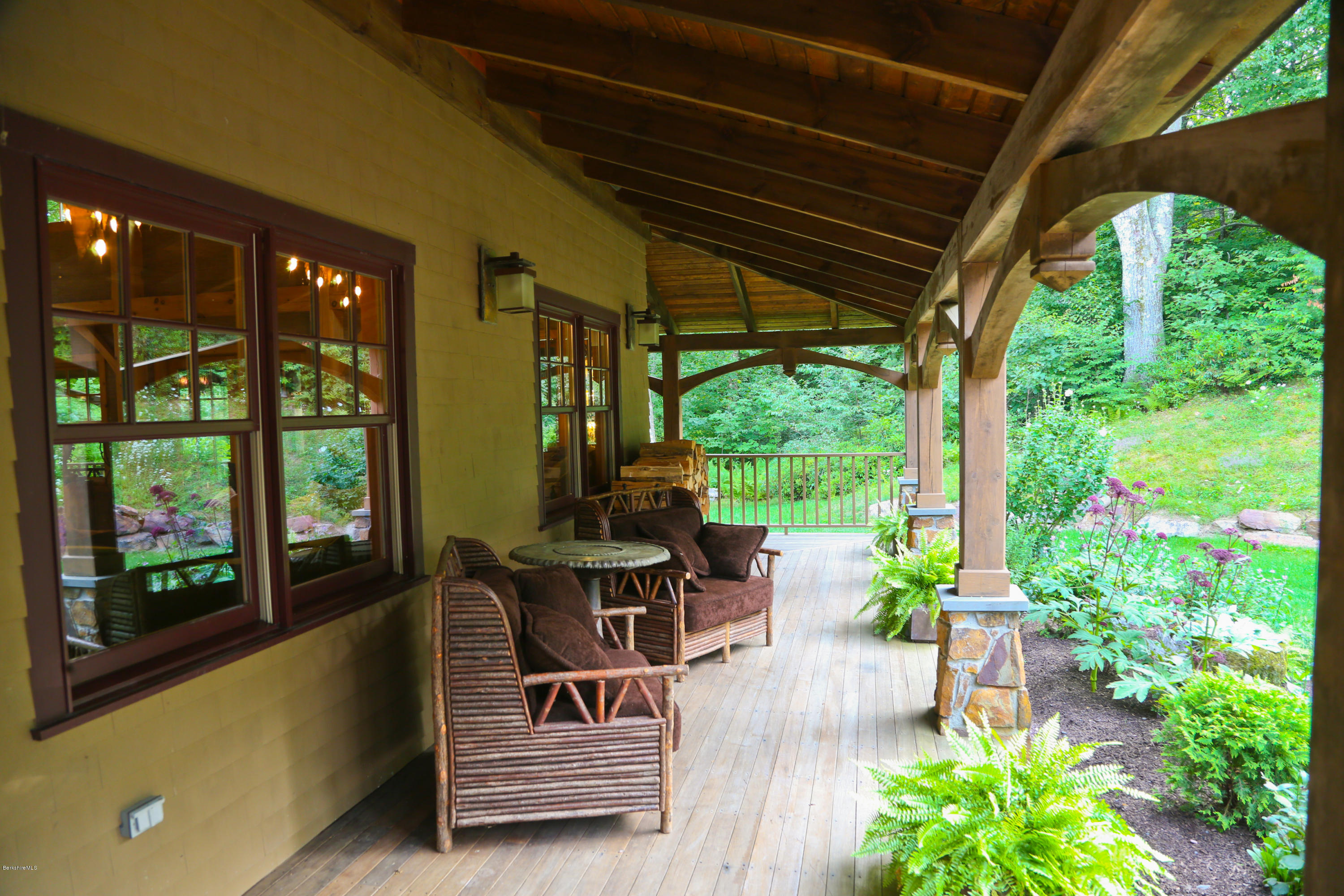 9 Mt Hunger Road Monterey, MA 01245 - Photo 6 of 44 a outdoor living space with furniture and garden view