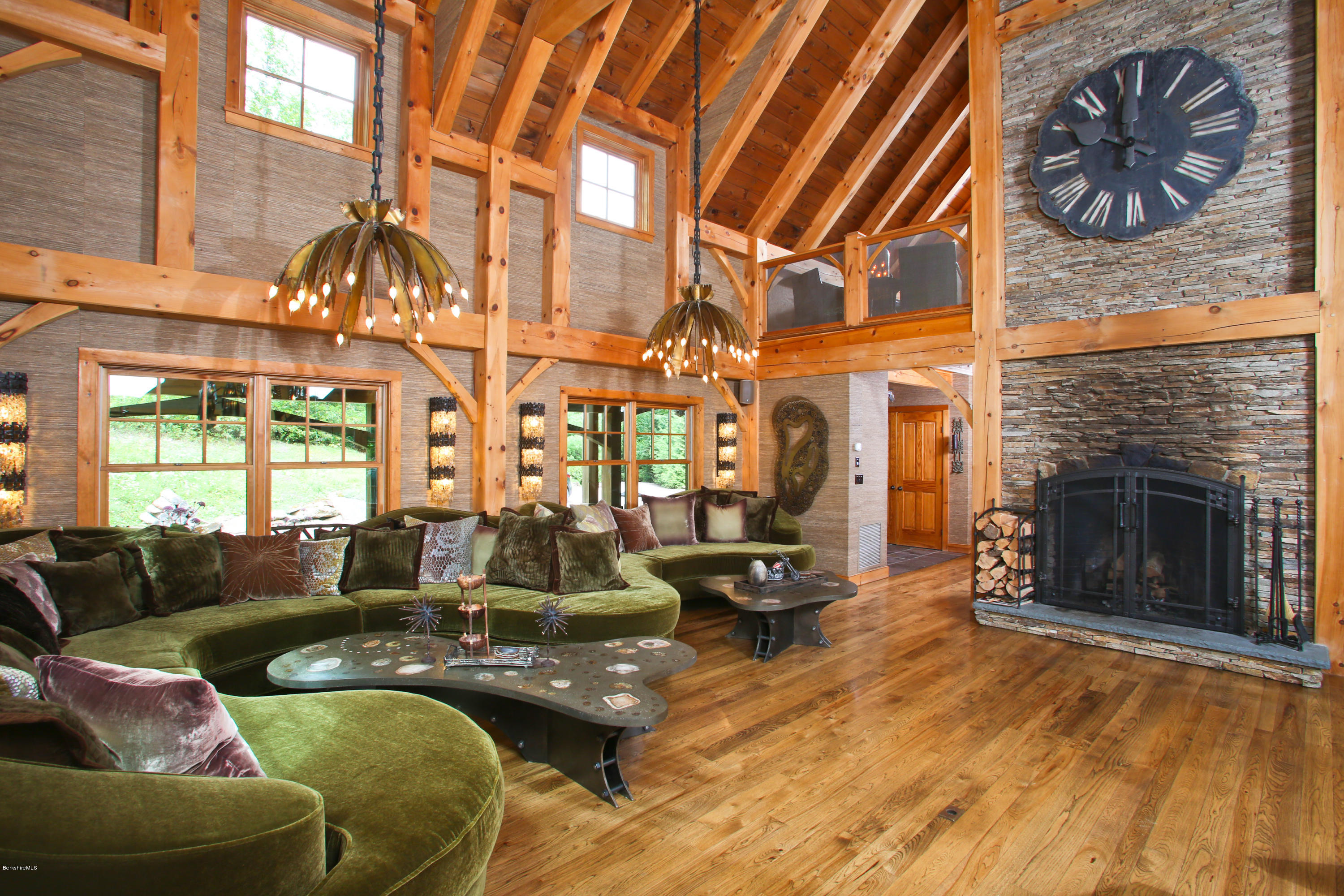 9 Mt Hunger Road Monterey, MA 01245 - Photo 10 of 44 a living room with furniture a fireplace and walls