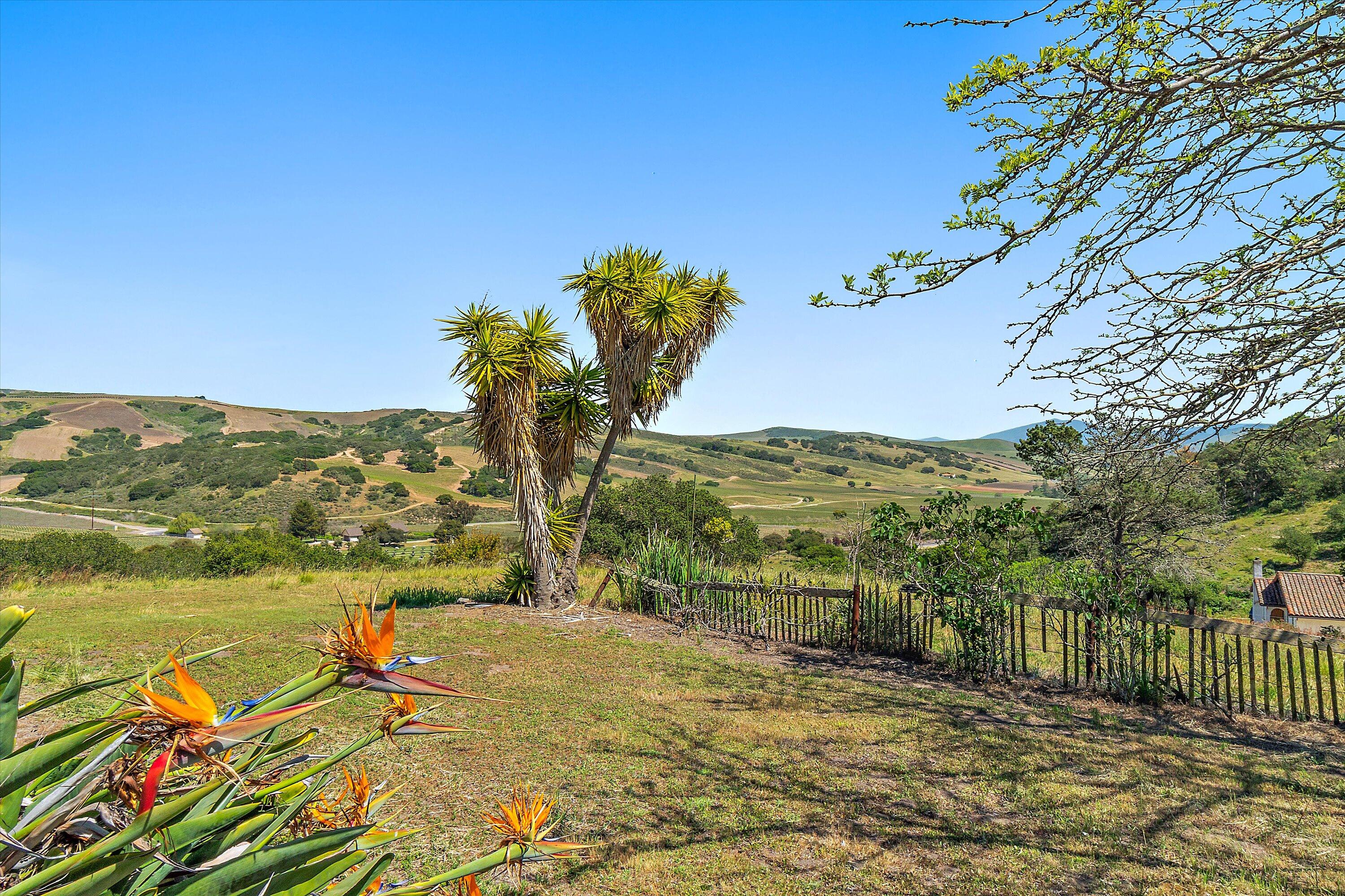 6060 Highway 246 Lompoc, CA 93436 - Photo 12 of 39 a view of a lake with a mountain in the background