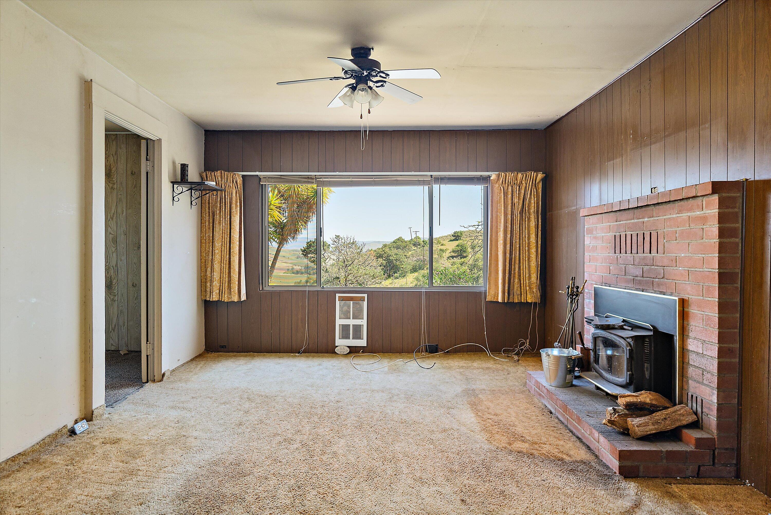 6060 Highway 246 Lompoc, CA 93436 - Photo 5 of 39 a view of livingroom with furniture and a fireplace