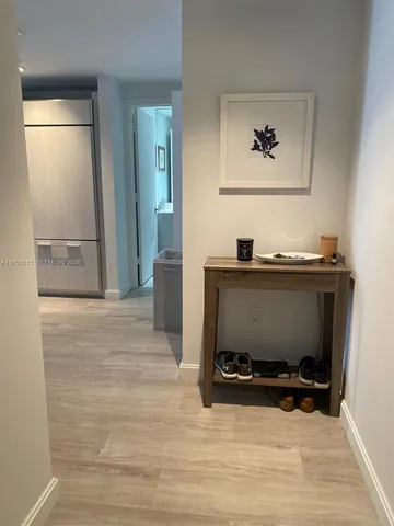 a view of workspace with a flat screen tv