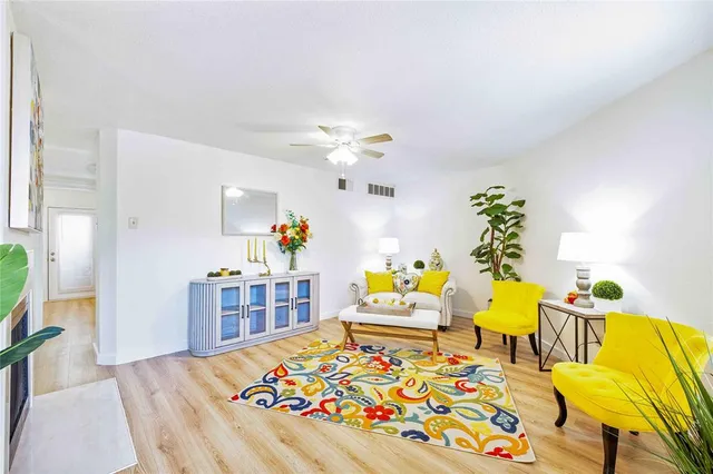 a living room with furniture and a table