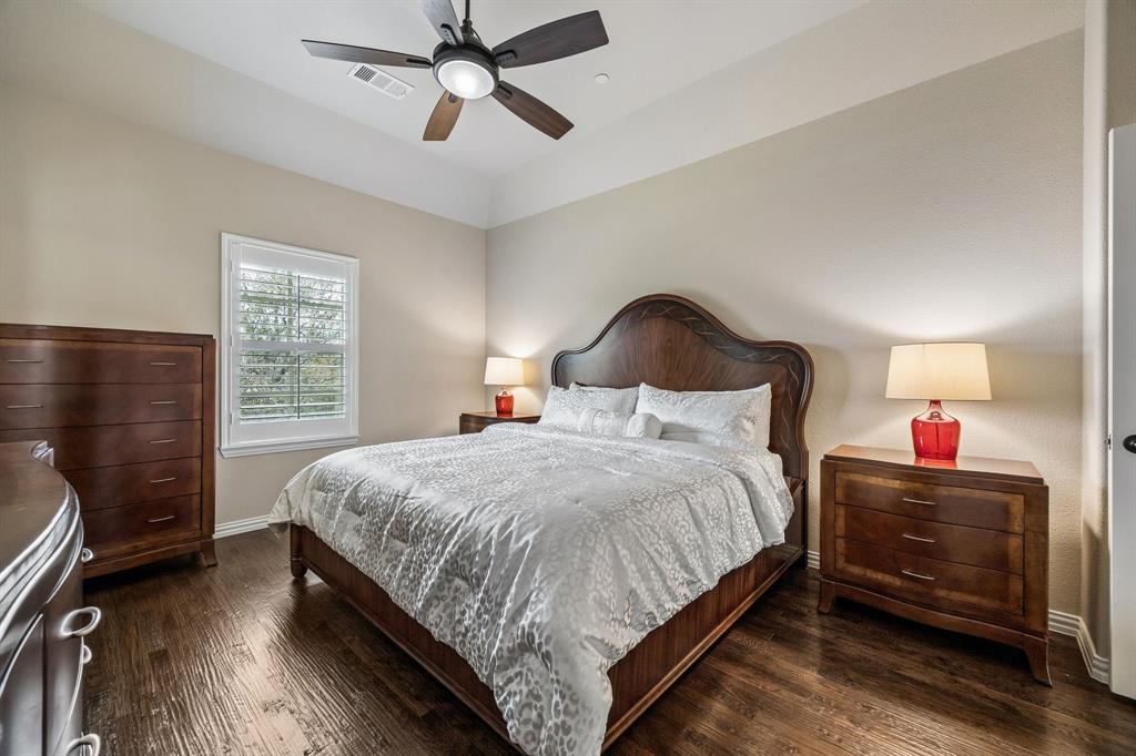 1005 Berkshire Road Southlake, TX 76092 - Photo 33 of 40 a bedroom with a bed and wooden floor