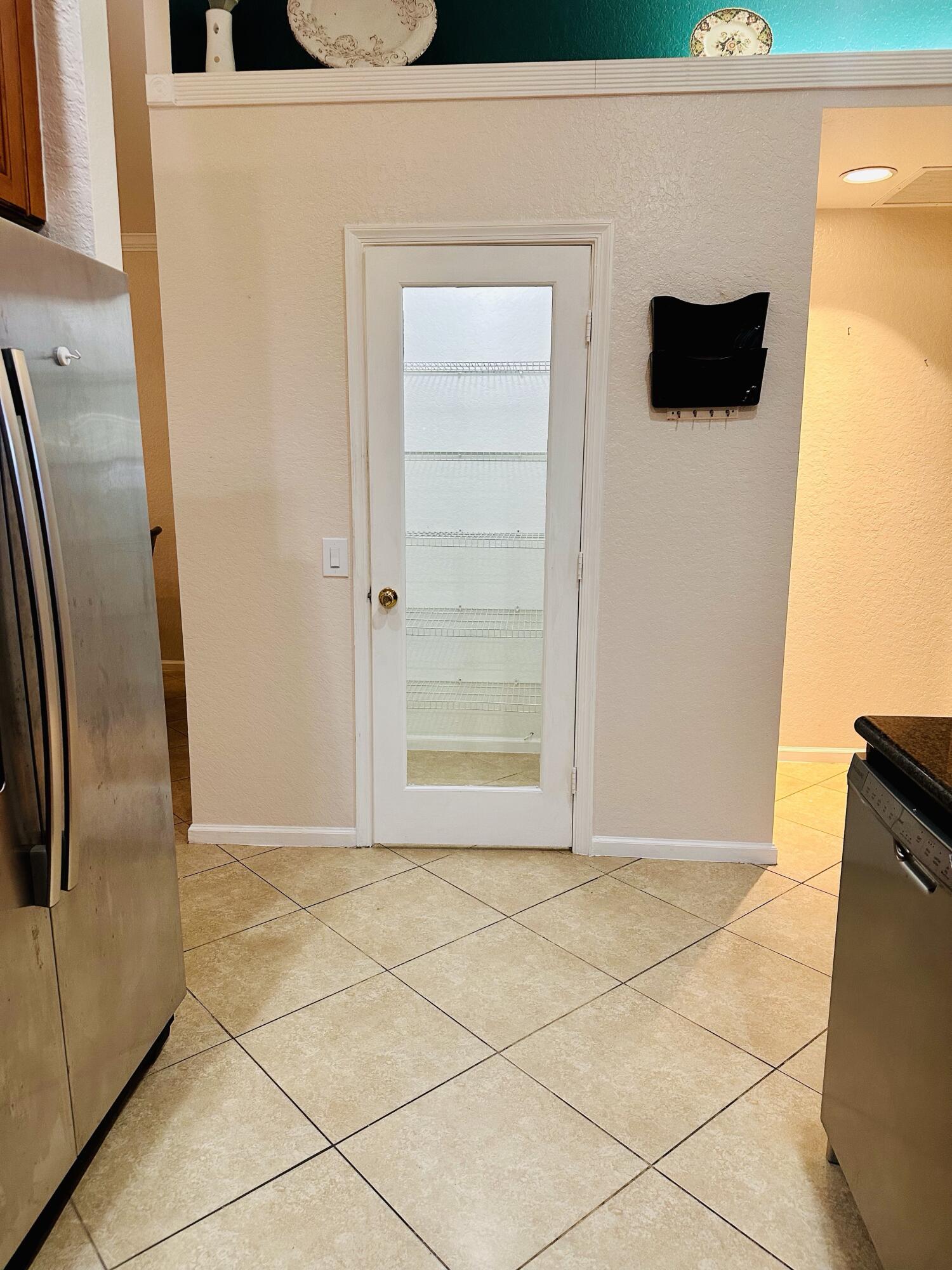 5200 Rising Comet Lane Greenacres, FL 33463 - Photo 9 of 50 a view of entryway