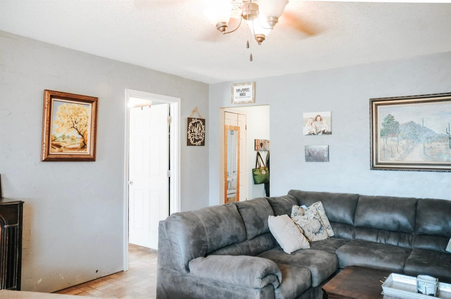 309 Ranch Street Ropesville, TX 79358 - Photo 4 of 26 a living room with furniture and a couch
