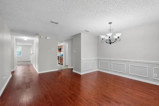 a view of livingroom with wooden floor